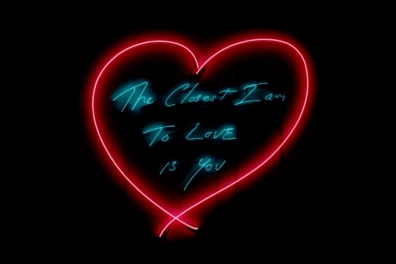 Tracey Emin's light artwork with the shape of a heart and a text inside.
