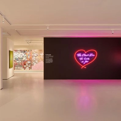 Interior of Moco Museum London with neon heart artwork